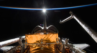 Illustration for article titled A Robotic Arm in Space Mixes Brawn and Beauty